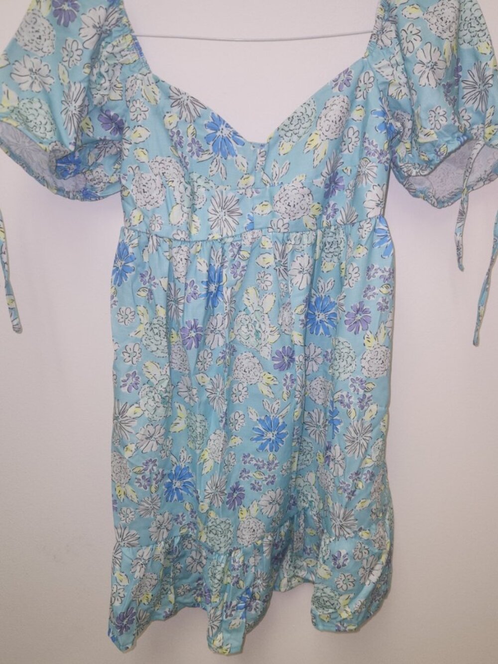 English Factory babydoll dress features a light blue floral print